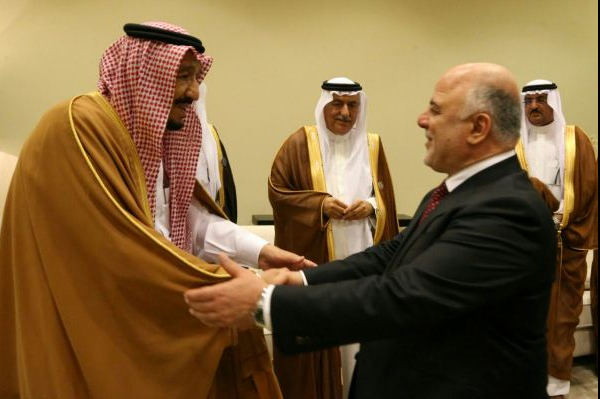 الملك سلمان يلتقي رئيس وزراء العراق حيدر العبادي على هامش قمة عمان