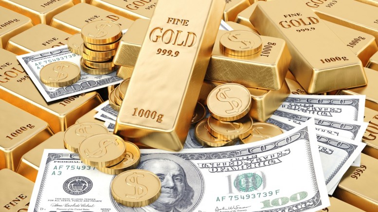 الدولار يتذبذب والذهب يستقر